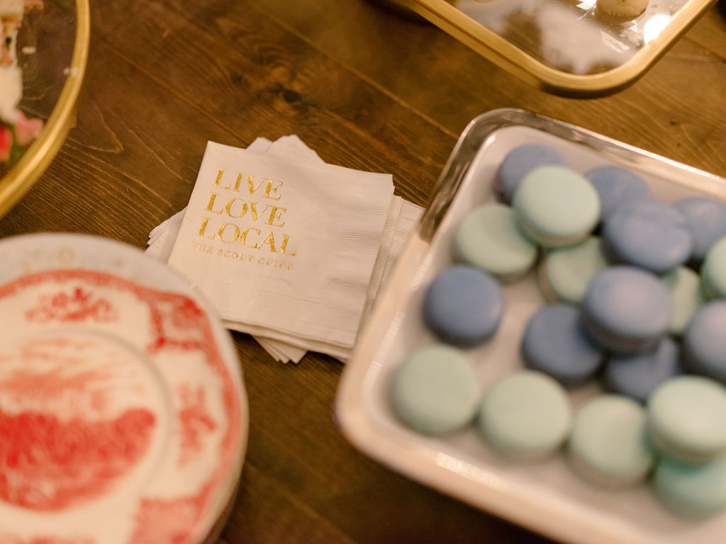 Blue macarons with white cocktail napkins