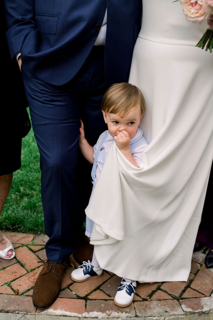 Couple's son hiding in bride's dress