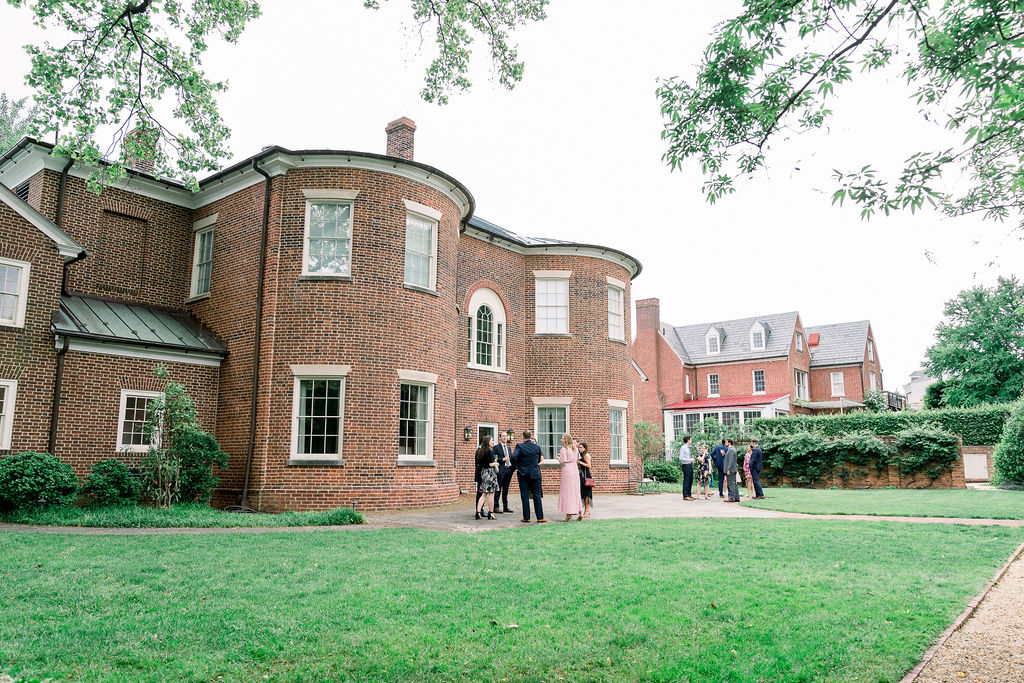 Spring Wedding at Dumbarton House - view of mansion with guests mingling