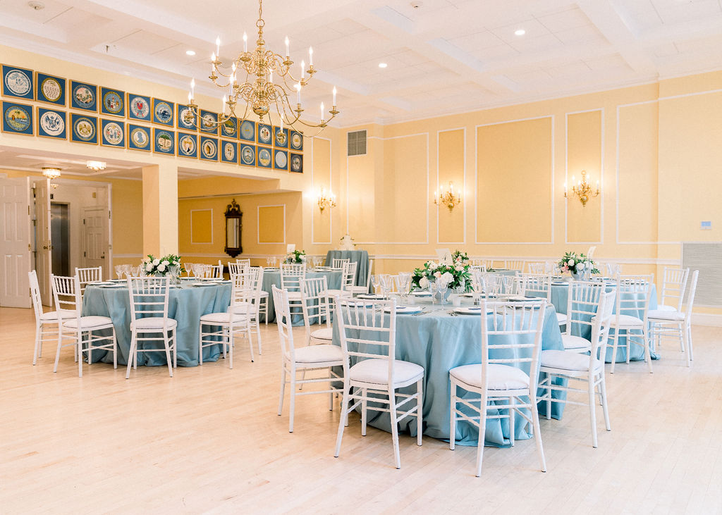 Spring Wedding at Dumbarton House -Wedding reception with blue table linens and white Chiavari chairs